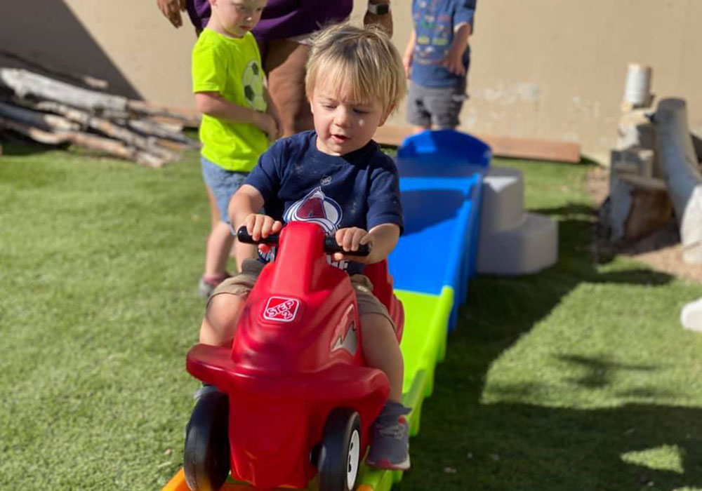 Little ones need to be on the move, and your toddler gets tons of opportunities to stretch their legs. Running, climbing, sliding, and exploring works off the wiggles, builds crucial muscle groups, and gives them vital gross motor skill practice.